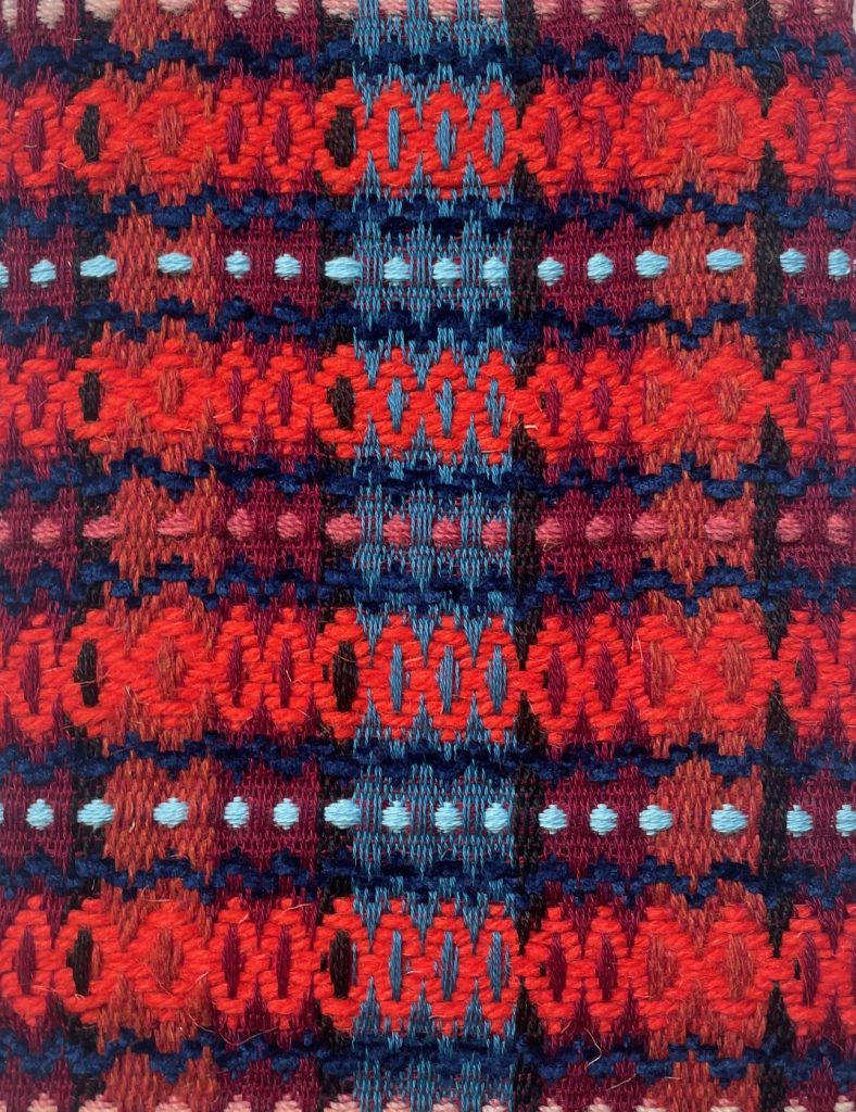 My work red and blue woven fabric