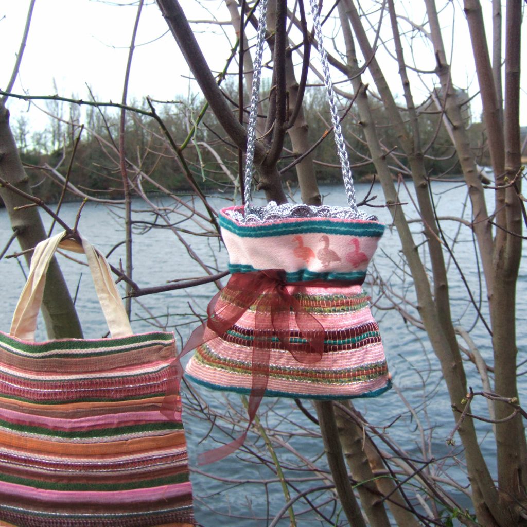 Fairytales Two woven bags hanging from branches