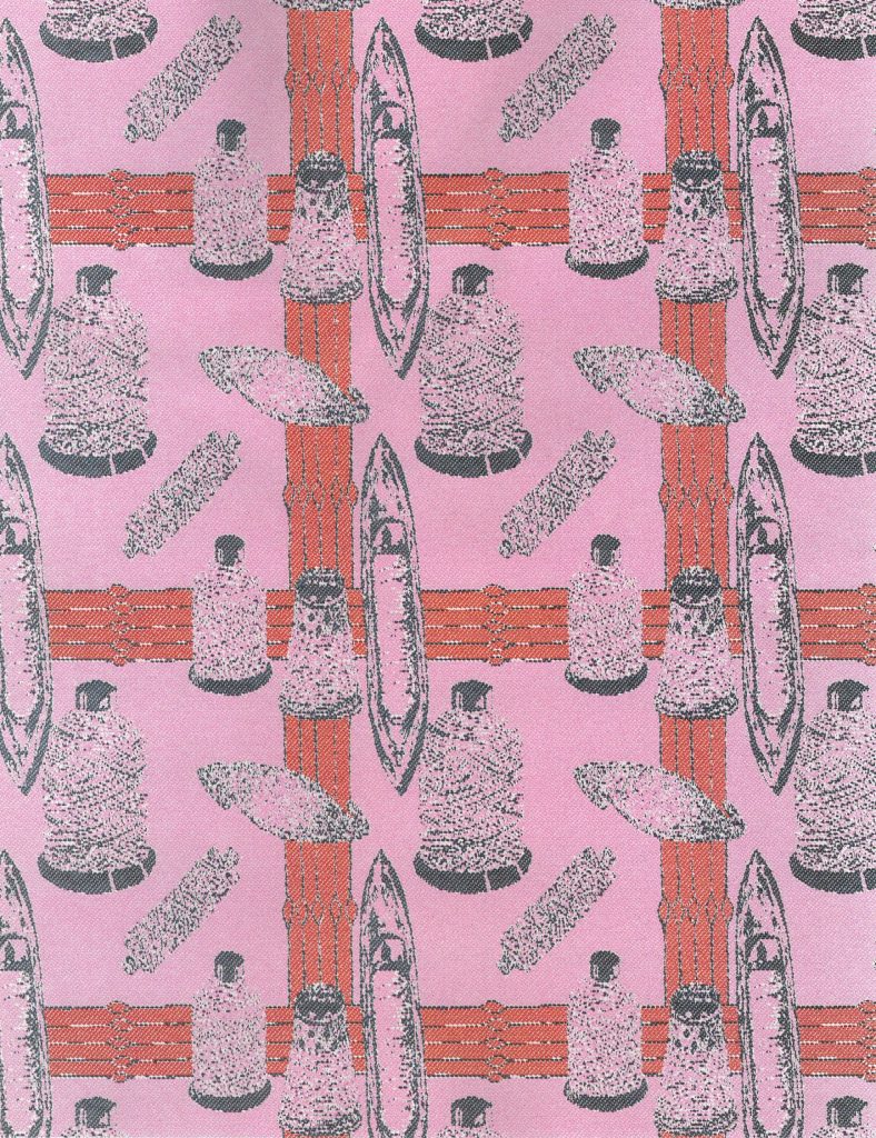 My work pink Jaquard fabric with a design featuring shuttles and bobbins