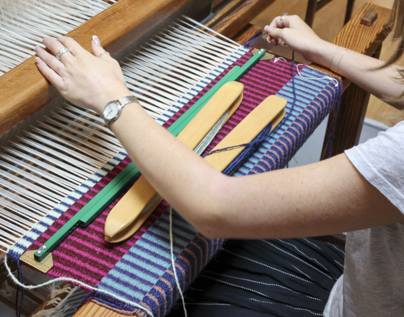 About me weaving a rug