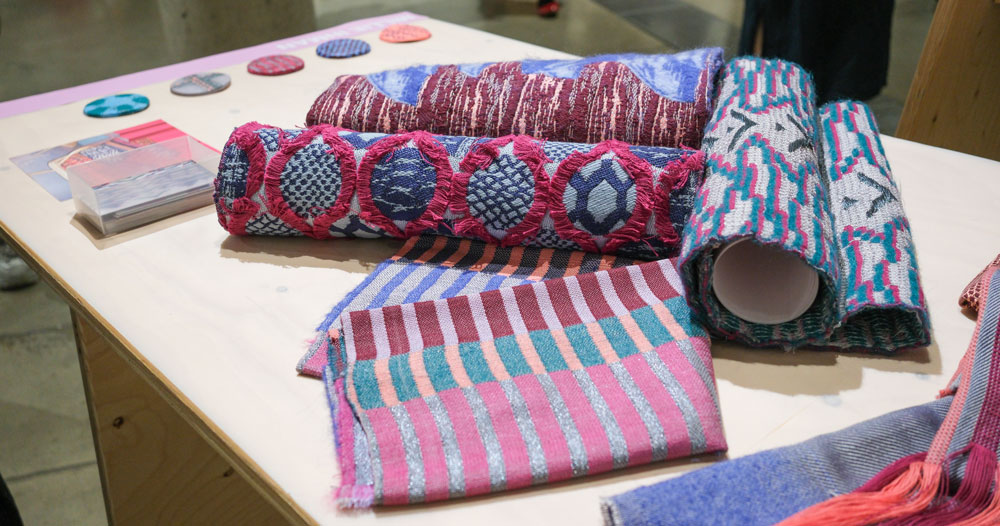 Millie Inman's designs at the Central St Martin's Graduate Showcase 2026. Woven fabrics in pinks and blues.